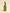 Aumenta Brilho Brasileiro castor oil in a green 60 ml glass bottle with a gold dropper cap, on a cream background